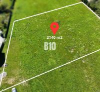 ABC stavebné pozemky - Pozemky v obci Nesluša ponúkajú plochu na bývanie s rozlohou 2140 m².