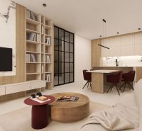 VEĽKORYSÝ 2i byt s rozlohou 76 m² v atraktívnej lokalite- Staré mesto - 2-izbový byt s knižnicou, mramorovým dekórom a kuchyňou s červenými stoličkami.