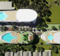 SOLE MIO RESIDENCES PHUKET - Letecký pohľad na výstavbu bytov v Phukete so strešnými bazénmi a zeleňou.