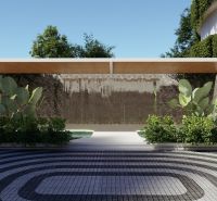 SOLE MIO RESIDENCES PHUKET - Exteriér vo výstavbe bytov v Phukete, s lístím a dekoratívnou stenou pod prístreškom.