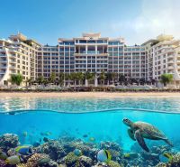 Predaj 2-izbového bytu, Zanzibar - Hotel pri pláži v Paje, v popredí korytnačka a pestrofarebné ryby.