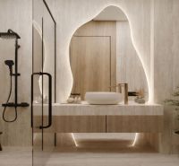 Predaj 2-izbového bytu, Zanzibar - Elegantná kúpeľňa s moderným sprchovacím kútom a podsvieteným zrkadlom v 2-izbovom byte.