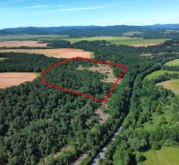 Domaníky – 49.000 m2 LESNÝ REKREAČNÝ POZEMOK v podiele 1/1 - Zalesnená oblasť a poľnohospodárske pozemky v Domaníkoch s vyznačeným územím.