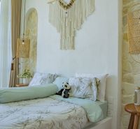 PREDAJ Unikátná 4KK Investičná zariadená vila s bazénom BALI-Jimbaran - Izba vo vile s pohodlnou posteľou, dekoráciami a priestorom na relaxáciu.