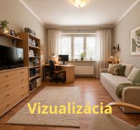 Na predaj priestranný 4-izbový byt - Robotnícka ulica, Banská Bystrica - Obývačka v 4-izbovom byte s podlahou s dreveným dekorom a pohodlnou sedačkou.