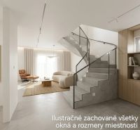 Moderná novostavba v Leviciach – bývajte komfortne / Predaj - Interiér rodinného domu s betónovým schodiskom, pohovkou a vitálnymi doplnkami.