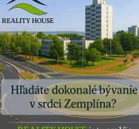 Pozemok pre Váš NOVÝ DOMOV  11km od Michaloviec - Budova s kruhovým objazdom a zeleňou v meste Michalovce.