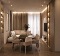 Albánsko, Drač - zrekonštruovaný byt  s výhľadom na more - Interiér Rekreačného apartmánu s pohodlným sedením, jedálenským stolom a podlahou s dreveným dekorom.