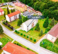 PREDAJ | 2-izb. byt 59 m² + loggia | Š. Michaľany - Pohľad na obytné domy a zeleň na ulici Pod lesíkom, Šarišské Michaľany.