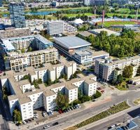 2 - IZBOVÝ BYT | BRATISLAVA III | VAJNORSKÁ  - Letecký pohľad na okolie Vajnorskej ulice v Bratislave - Novom Meste so športovým štadiónom.