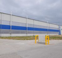 Priemyselná hala 2 500 m²  SKLADOVANIE, VÝROBA, LOGISTIKA - Výrobné priestory na Priemyselnej ulici v Galante s modro-šedým dizajnom a nákladným autom.