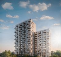 2-izbový byt s predzáhradkou, Brenner – Residence | Ružinov - Výšková budova na Mlynských Nivách v Bratislave - Ružinove s balkónmi a zeleňou.