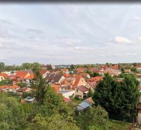 3-izb. byt na ul. Hornádska, Podunajské Biskupice - Pohľad na zeleň a strechy domov v Bratislave-Podunajských Biskupiciach, Hornádska.
