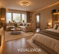PREDAJ: 1 izbový byt; 38 m²; BREZNO ;89.500 € - Elegantná obývacia izba s pohodlným nábytkom a podlahou s dreveným dekorom.