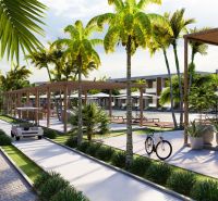 Hotelový a rezidenčný komplex THE TERRACE v Paje, Zanzibar - Palmy, cestičky, golfové vozíky a odpočívadlá vo výstavbe bytov v Paje.