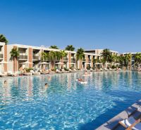 Hotelový a rezidenčný komplex THE TERRACE v Paje, Zanzibar - Luxusné apartmány vo výstavbe bytov v Paje s bazénom a palmami na ostrove.