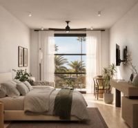 Hotelový a rezidenčný komplex THE TERRACE v Paje, Zanzibar - Spálňa s posteľou, rastlinami, písacím stolom a podlahou s dreveným dekorom.