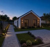 MODERNÝ 4-IZBOVÝ RODINNÝ DOM V ŠTÝLE BARNHOUSE – Veľká Mača  - Veľká Mača: Rodinný dom na ulici Veľká Mača s osvetleným chodníkom a záhradou.
