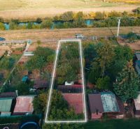 3.izbový byt so záhradou /420 m²/ a chatkou BOŠANY - Záhrady a pozemky neďaleko rieky v Bošanoch, ulica Janka Kráľa, 3-izbový byt.