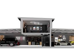 Štýlová garáž s luxusnými autami a galériou, súčasť obchodných priestorov.