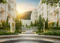 Výstavba bytov v Phuket s elegantnou architektúrou a upravenou zeleňou v exteriéri.