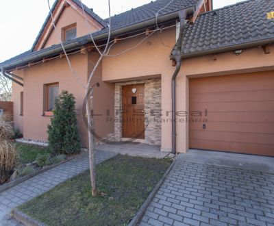 NA PREDAJ priestranný 4-izbový rodinný dom s garážou v obci Zohor