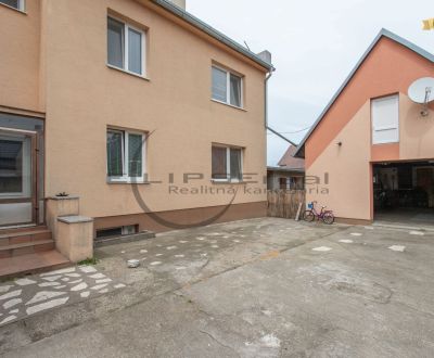 NA PREDAJ priestranný 4 izbový rodinný dom s veľkou záhradou v Stupave