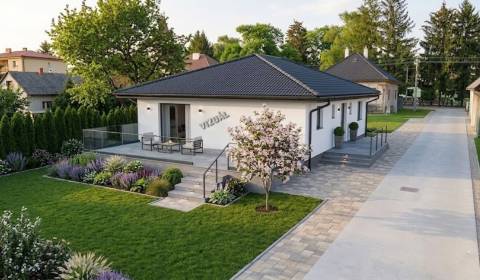 BUNGALOVY S FOTOVOLTIKOU A TEPEL.ČERPADLOM v obci Podlužany pri BN