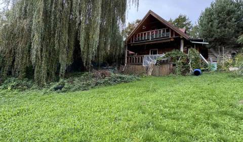 Na predaj: Drevená chata v lone prírody s pozemkom 7212 m² 