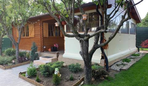 REZERVOVANÉ! Predáme záhradu so zrubovou chatou, Nitra - Dolné Krškany