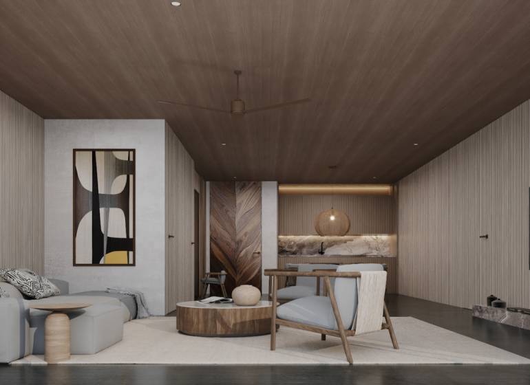 KRÁĽOVSKÝ APARTMÁN V LUXUSNOM ZANZIBARSKOM KOMPLEKSE - Interiér rodinného domu so sedačkou, kreslami a umeleckým dielom na stene.