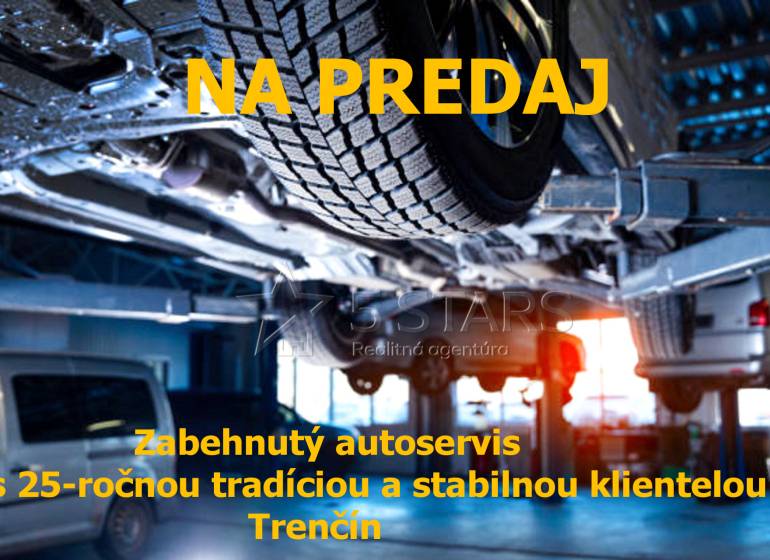 Predaj autoservis s 25-ročnou históriou a stabilnou klientelou Trenčín - Interiér autoservisu s automobilom na zdviháku, predaj v Trenčíne, sklady a haly.