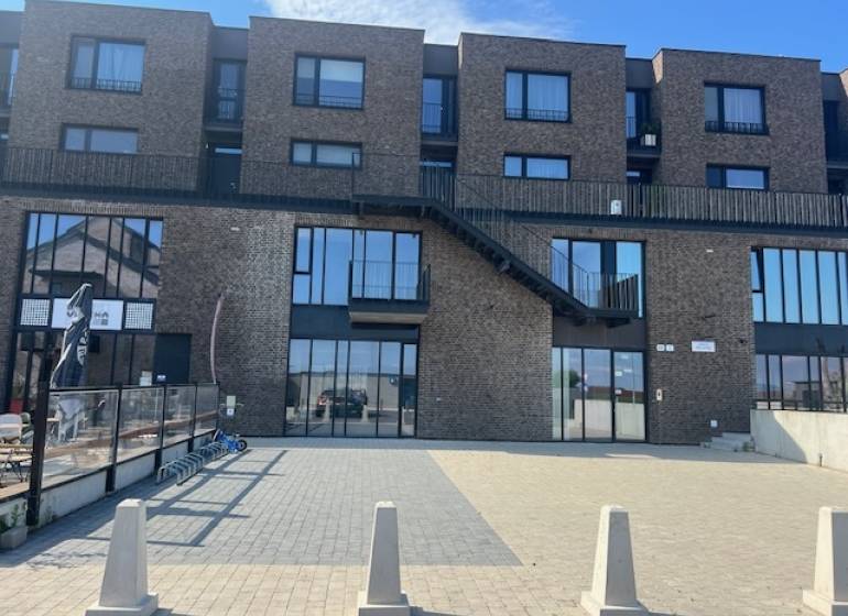 PREDAJ VEĽKORYSÝ 2 IZBOVÝ BYT NOVOSTAVBA DESINGN CENTER - Exteriérový pohľad na bytový komplex v Bratislave - Jarovce na Námestí pri Sýpke.