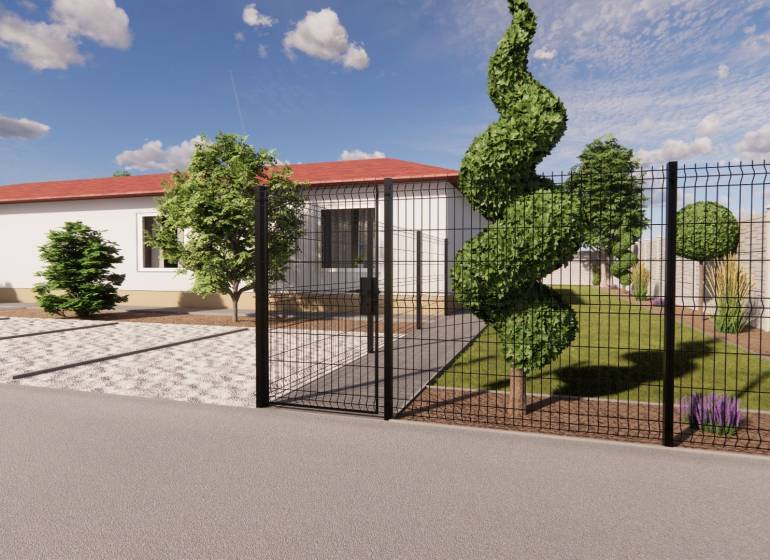 NA PREDAJ 3-IZBOVÝ RD (ČASŤ DVOJDOMU), ZEMIANSKA OLČA - Rodinný dom v Zemianskej Olči s upravenou záhradou a dekoratívnymi stromami za plotom.