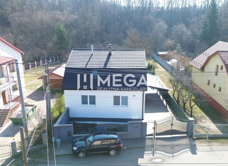TOP CENA NA PREDAJ UNIKÁTNY RODINNÝ DOM MEDZILABORCE - Rodinný dom na ulici Kpt. Nálepku v Medzilaborciach s garážou a záhradou.