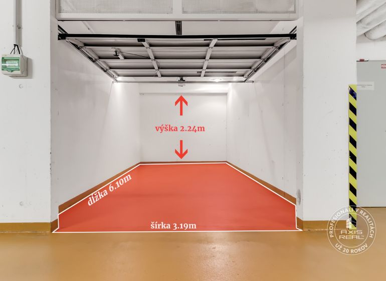 UZAMYKATEĽNÁ GARÁŽ 20m2 v NOVOSTAVBE Vodotika, Lužná ul. - Parkovacie miesto v garáži s červenou podlahou, rozmery 6,10m x 3,19m.