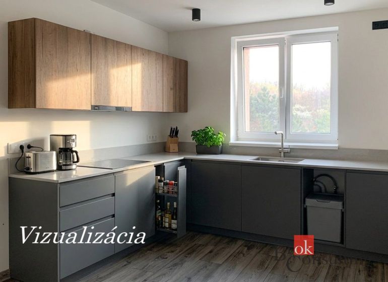Krásny 1 izbový byt  45m2 + garáž - Kuchyňa v 1-izbovom byte s podlahou s dreveným dekorom a kuchynskou linkou.