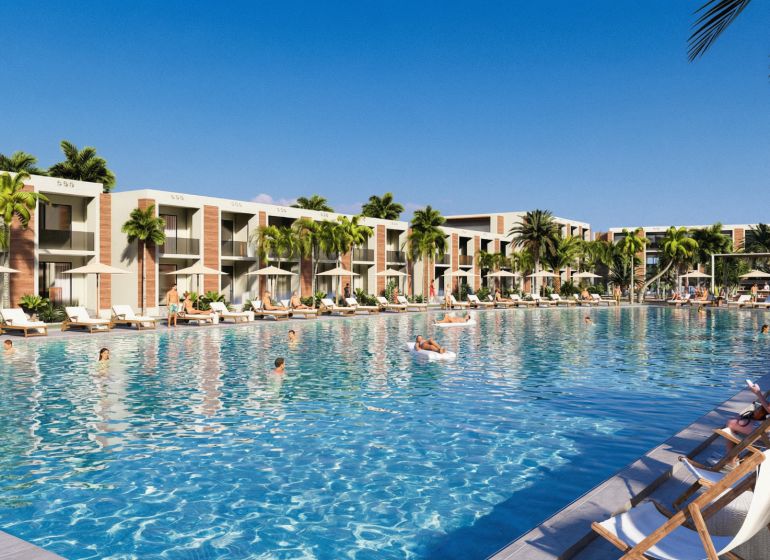 Hotelový a rezidenčný komplex THE TERRACE v Paje, Zanzibar - Luxusné apartmány vo výstavbe bytov v Paje s bazénom a palmami na ostrove.