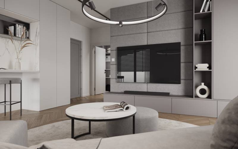 Novostavba: 2-izbový byt, 12 km od Viedne, Münichsthal - Interiér 2-izbového bytu s televízorom, stolíkom a svetlými stenami na ulici Münichsthal.