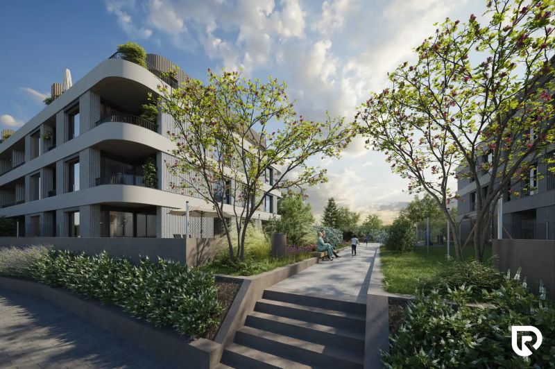 Rezidencia Karpatská (C.3E), 2i byt 60 m2 s loggiou 6 m2, TN - Budova s modernou architektúrou obklopená zeleňou na Karpatskej ulici v Trenčíne.