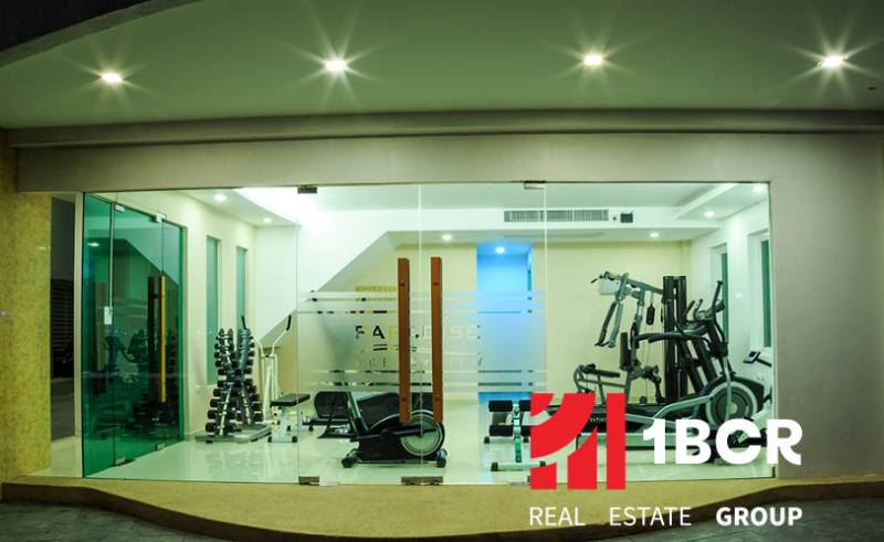 PARADISE OCEAN VIEW PATTAYA - Fitness centrum s posilňovacími strojmi, súčasť výstavby bytov.
