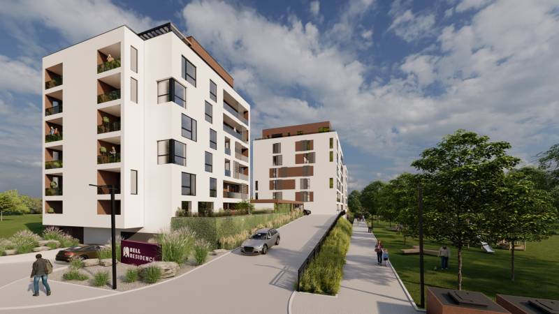 2i byt  A.3.1 - Bell Residence - Moderné budovy s terasami, autami a chodcami v parku na ulici Suchoňova.