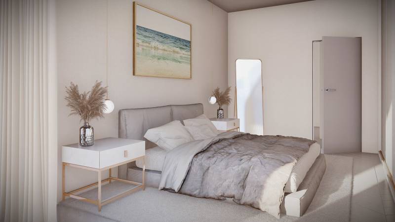 2i byt  A.3.1 - Bell Residence - Svetlá spálňa s komfortnou posteľou, obrazom mora a elegantnými stolíkmi v 2-izbovom byte.