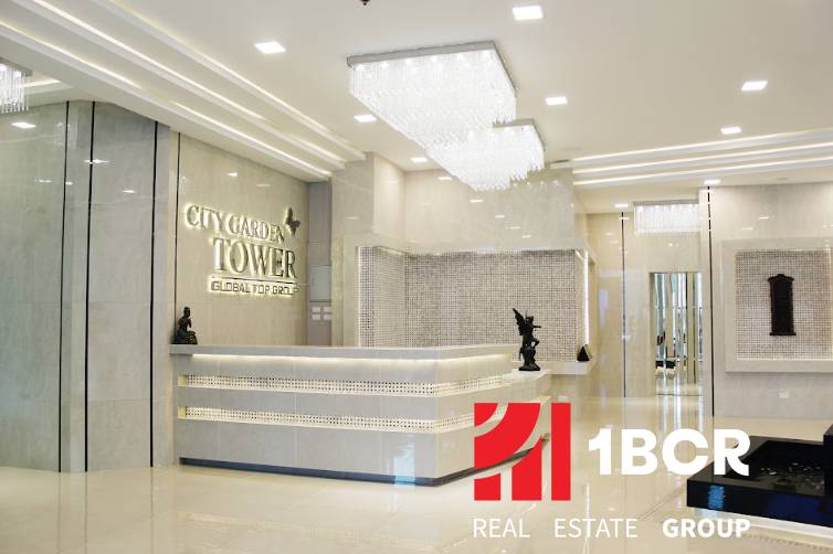 CITY GARDEN TOWER PATTAYA - Recepcia v bytovom komplexe s nápisom 