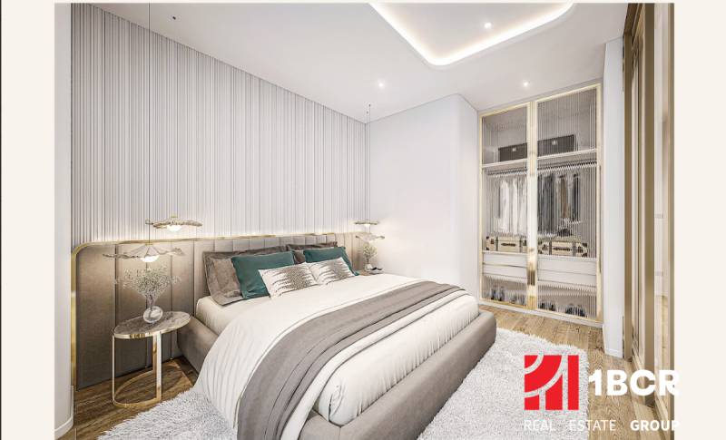 1 IZBOVÝ APARTMÁN (1 SPÁLŇA + 1 OBÝV. IZBA) SEASPIRE JOMTIEN PATTAYA - Spálňa v 2-izbovom byte so štýlovou posteľou a vstavanou skriňou.