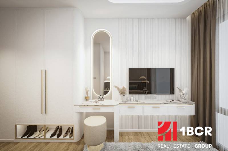 2 IZBOVÝ APARTMÁN (2 SPÁLNE + 1 OBÝV. IZBA) SEASPIRE JOMTIEN PATTAYA - Moderný interiér s toaletným stolíkom v 3-izbovom byte, nadčasový dizajn s dôrazom na detaily.