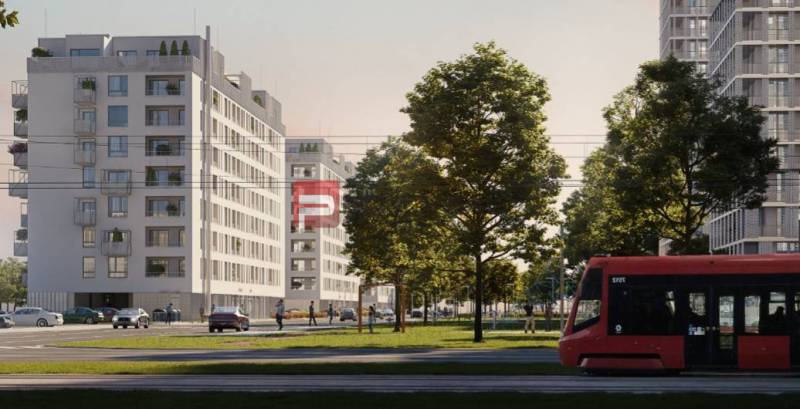2-izbový byt Slnečnice POP pri novej električke do centra! - Budovy na ulici Labutia, Bratislava V, so zeleňou a električkou v popredí.