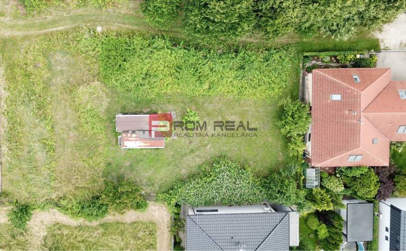 Rovinatý ideálny stavebný pozemok 609 m2 Marianka - Letecký pohľad na lokalitu pre Pozemky - bývanie v Marianke, Na Tálkoch.