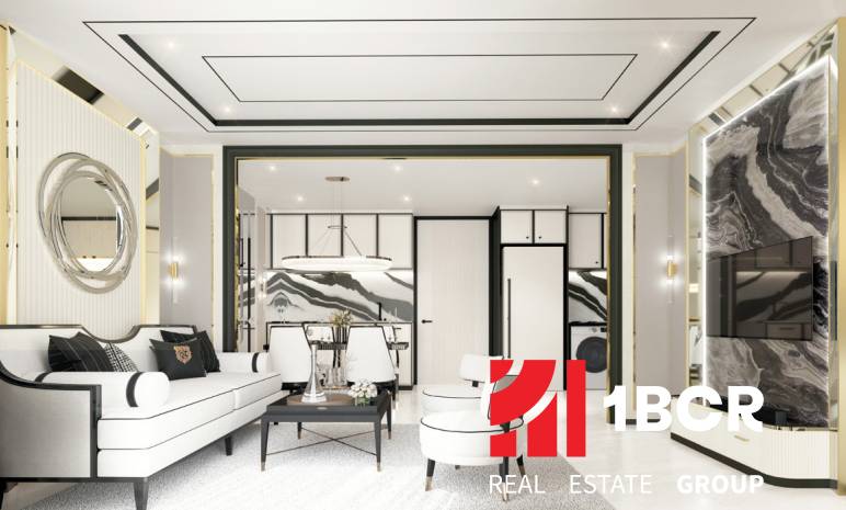 2 IZBOVÝ APARTMÁN (2 SPÁLNE + 1 OBÝV. IZBA)  EMBASSY LIFE PATTAYA - Luxusný interiér 3-izbového bytu s elegantným sedením a moderným osvetlením.