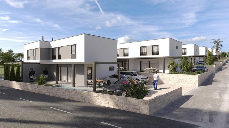 CHORVÁTSKO - Nový apartmánový komplex - MANDRE, ostrov PAG - Radová zástavba moderných domov s bazénom a príjazdovou cestou v Mandre.